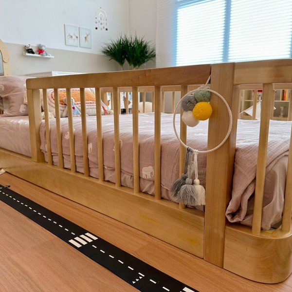 Handcrafted solid wood bed detail